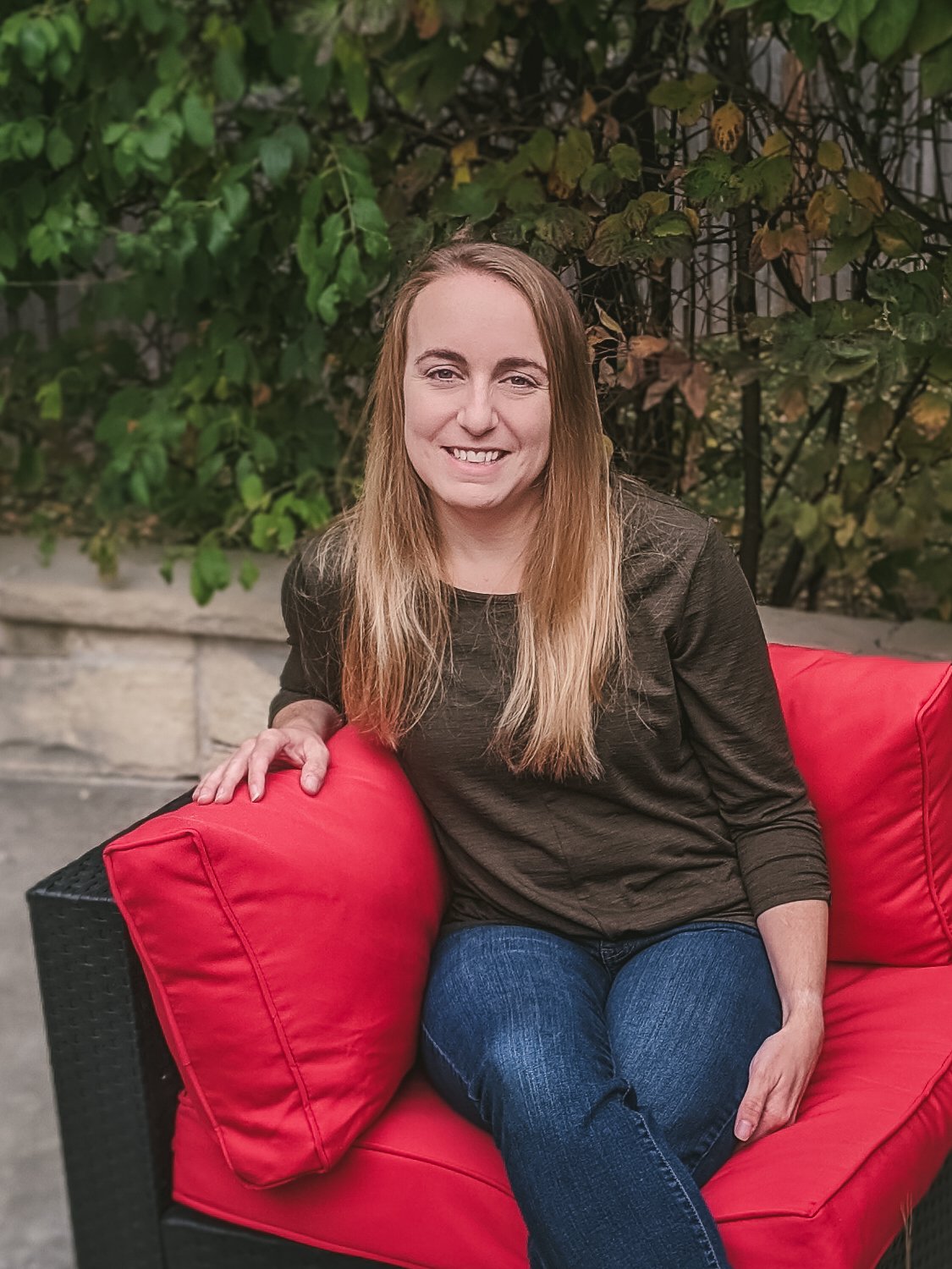 Brynn sitting in chair